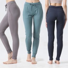 Pantalon de Yoga taille haute Sport femmes pantalon à séchage rapide femmes cordon de serrage vêtements de Sport femme Sport décontracté lâche Fitness Runn2464