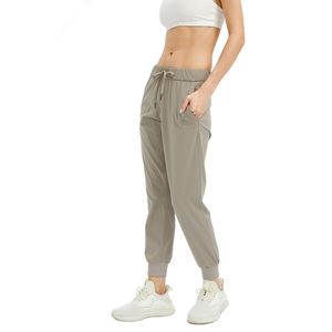 Pantalon de yoga taille haute Sport Femme Pantalon à séchage rapide Femme Cordon de serrage Sportswear Femme Gym Sports Casual Loose Fitness Running Leggings