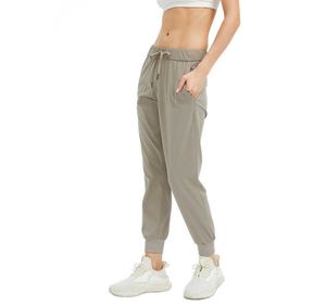 Pantalon de yoga taille haute Sports Pantalon à séchage rapide Vêtements de sport pour femmes avec cordon de serrage Taille haute Levage des fesses Respirant Sports Casual Loose Fitness Running Leggings