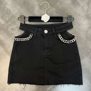 Hoog getailleerde elastische denim rok, zomer dames nieuwe veelzijdige afslankende taille holle pittige meisje wrap hippe korte rok groothandel