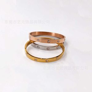 Design de qualité haut de gamme hommes et femmes pour bracelet en ligne Vente de boucle incrustée de diamant rouge 18k plaquée en or rose couple avec un bracelet de tempérament