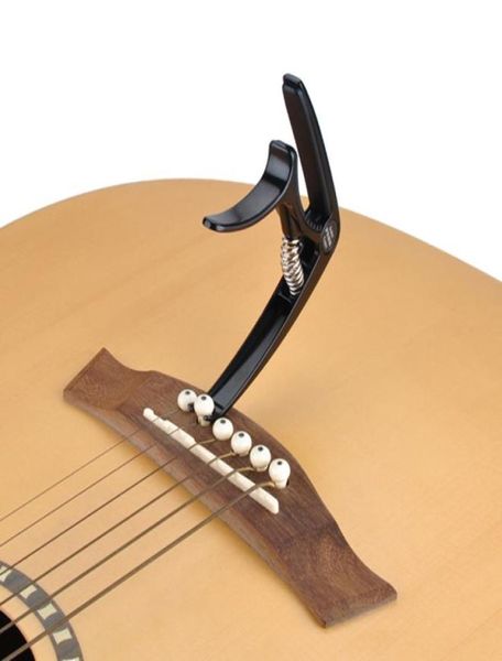 Cejilla de guitarra de Metal de aleación de Zinc de alta gama con cuerda de tracción protección de silicona para uñas gatillo Capo llave Clamp8652929