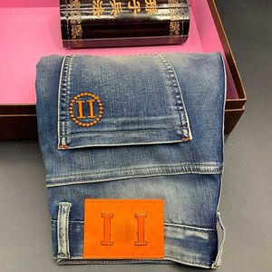 Hogere versie heren jeans casual broek designer broek brief borduurwerk mode knop toegang mannen fvzy
