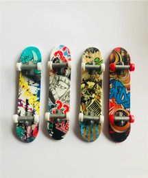 Kinderen Speelgoed Animatie Naburige Model Vinger Board Truck Mini ABS Skateboard Spelen Speelgoed Vinger Skateboards c0346618132