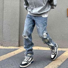 Hip Hop Ink Painted Hole Frayed Casual denim broek Mens en vrouwen Harajuku Straight Patchwork Baggy oversized jeans broek T220803
