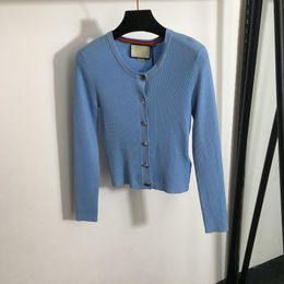Tops de punto de creación Tops Personalidad Botón de diseñador Séteres de modernas Cardigan Sweater Femenino Slim Designer Tops Clothing