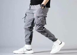 Hip Hop Mannen Pantalones Hombre High Street Kpop Casual Cargo Broek Veel Zakken Joggers Modis Streetwear Broek Harajuku Voor Mannen9559010