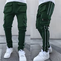 Pantalones casuales de hip hop para hombres, deportes de carga multibolsillos reflectantes rectos grandes europeos 220325