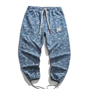 Hiphop print jeans voor mannen losse mode vintage trekkoord broek stijl mannelijke gedrukte denim broek plus size 5XL streetwear 210601