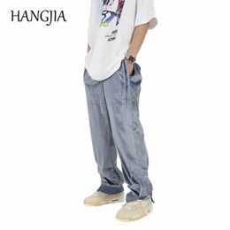 Hip Hop Streetwear Velvet para hombre Pantalón de pierna ancha con cremallera lateral ajustable Negro Azul Joggers Pantalones Mujeres para hombre Velour Baggy Sweetpant C0607