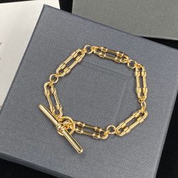 Hiphop-stijl Y-merk gouden armband vergrendelt de unieke bedelarmband-sieraden van een vrouw