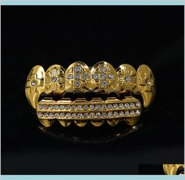 Hip Hop Dientes Chapado en oro y plata Cristal 6 Aparatos de dientes falsos superiores e inferiores Rapero Joyería para el cuerpo Unisex Ngywc Grillz Wicjr3282479