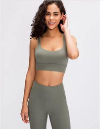 HISIMPLE 2020 Mujer Sujetador deportivo Push Up Ropa activa Tops para mujer Gimnasio Sujetador rosa Sujetador deportivo Criss Cross Crop Top Sólido Mujer Y2195123