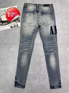 HM120013 PAARS Heren jeans van hoge kwaliteit Distressed Motorcycle biker jeans Rock Skinny Slim Gescheurde gatstreep Modieus slangenborduurwerk Denim broek O