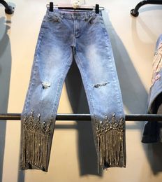 Trous Denim Pantalons Lady Printemps Vêtements d'été Nouveau lourd clouté perlé à franges taille haute mince neuf cents jeans filles 201105