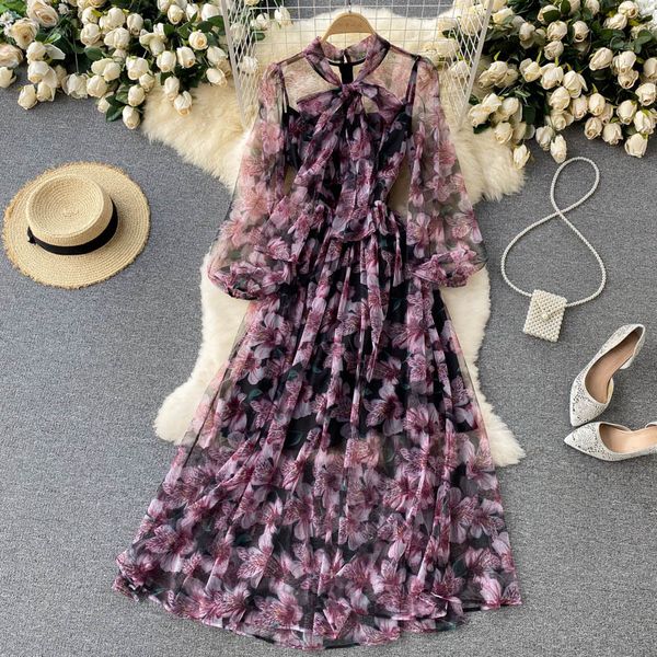 Style de vacances Grande robe ourlet Robe de printemps Nouveau motif de motif Cold de nœud à manches longues à manches longues