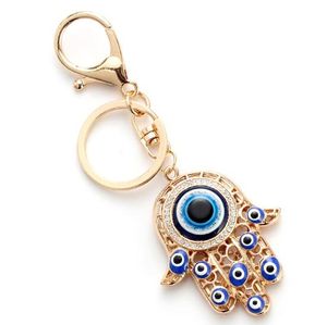 Porte-clés creux Fatima Hamsa main turquie yeux bleus, en alliage de verre, mauvais œil, accessoires de sacs à main de voiture, fermoir à homard