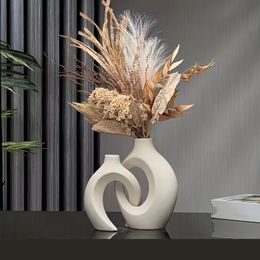 Vase en céramique moderne nordique creux ensemble de 2 pour la décoration de la maison moderneVases à fleurs creux Boho modernes pour étagère de salon 240311