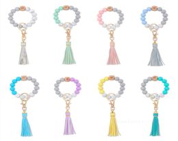 Home Party Favor Tassel Wood Beads Siliconen kralen Bracelet Key Chain Armbanden vrouwelijke polsbekledingsleutels Ring LT0139337959