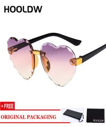 Hooldw 2020 Nuevas gafas de sol de niños sin borde Las niñas Amor de la forma del corazón de los niños Sun Gamias al aire libre Giros de viaje UV4009928186