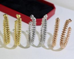 Boucles d'oreilles créoles de luxe européennes, bijoux pour marquage de rivets, fête à la mode, roue Rose classique de couleur or, 2023