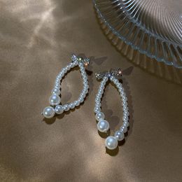 Creolen Huggie 925 Silber Nadel Mode Lange Perle Eingelegt Mit Diamantschleife Netz Rot Temperament Design Ohrringe. Weiblich