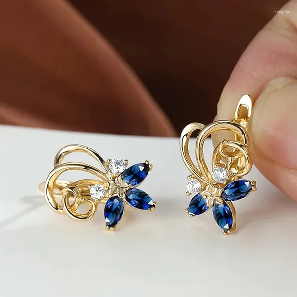 Pendientes de aro Huitan Color dorado flor azul para mujer temperamento diseñado Ly dulce accesorios para Piercing en la oreja joyería Floral