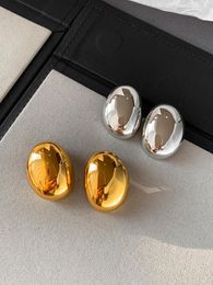 Boucles d'oreilles cerceaux en métal brillant en trois dimensions simples de créneaux simples de conception exagérée Temperrament Lady