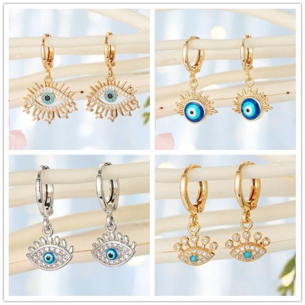 Hoop Huggie 1 paire femmes mode doré visage oeil strass boucles d'oreilles Cool Punk creux mal balancent boucle d'oreille résine pendentif Jewelry1