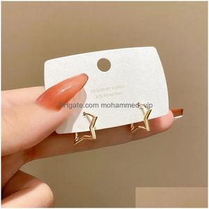 Hoop Huggie Boucles d'oreilles Minimaliste Golden Petite étoile pour femmes Quotidien Cuivre Géométrique Creux Hie Bague Boucle d'oreille Tendance 2022 Drop Deliver Dhgvq