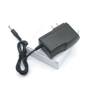 Umlight1688 Hot AC 100-240V à DC 9V 1A Convertisseur d'alimentation à découpage Adaptateur EU US AU UK Plug Livraison gratuite