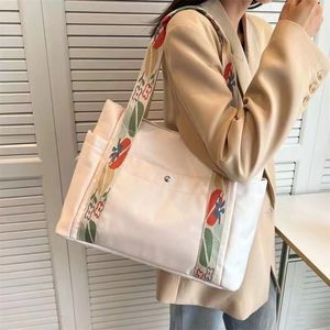 Hot Designer Bag Tas Tas grote capaciteit canvas draagtassen voor werk pendelende tas college -stijl student outfit boek schoudertas herbruikbare boodschappentassen aas