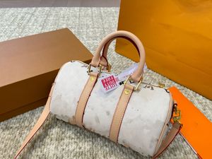 Diseñador caliente Bolso de lujo Mujer Hombre Moda Diseñador de bolsos Bolso de tambor Clásico naranja flores viejas bolso de hombro de cuero de lona recubierto