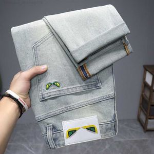 Diseñador caliente para hombre jeans Jeans Hombre Marca de moda Pequeño tubo recto Primavera / Verano Pantalones de mezclilla Big Bull Style New Men Pantalones elásticos