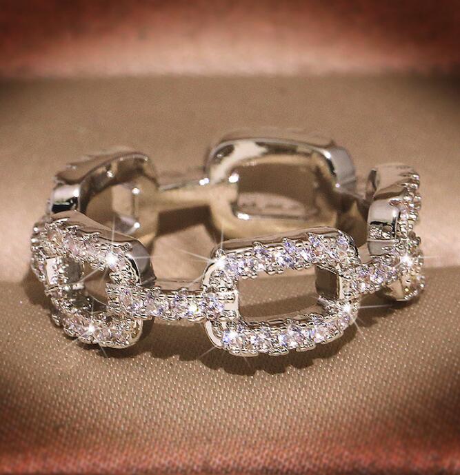 Het modemärke designerband ringar för kvinnor silver lysande kristallring fest bröllop smycken med CZ bling diamantsten