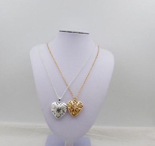 nouveau collier de coeur en forme de coeur chaud peut être ouvert dans de petites photos de collier de boîte en forme de coeur de coeur de fleur nvong évidée à la mode c
