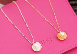 Caliente nuevo partido de Corea adornar artículo femenino edición han moda y simple temperamento perla shell modelado colgante corto clavícula neckl