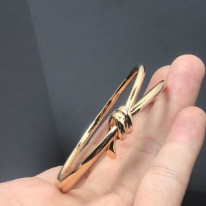 Heet plukken TFF armband knoop nieuw product kaal vale v gouden modeontwerp geavanceerd persoonlijkheid vlinder touw gewikkeld bp9w