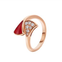 Hot Sale Bandringen Sieraden Ontwerper Fan Goud Kleine jurk Ring Wit Parelmoer Damesmode Verlovingssieraden Vervagingsvrij Non-allergeen Eenvoudige damesring