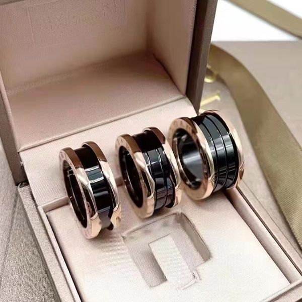 Ventas calientes Diseñador Anillo de bodas para mujer Negro Blanco Cerámica Primavera Hombres Anillo 18k oro Sin desvanecimiento Pareja Anillo Fiesta de compromiso Regalos Novia Joyería de lujo