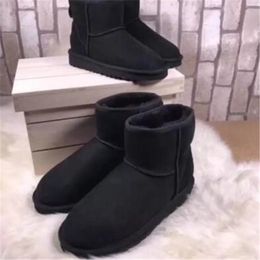 Vendre à chaud Nouveau Ausg Femmes classiques Gardez les bottes chaudes 585401 Femmes Mini Snow Boot US4-12 Transport gratuit