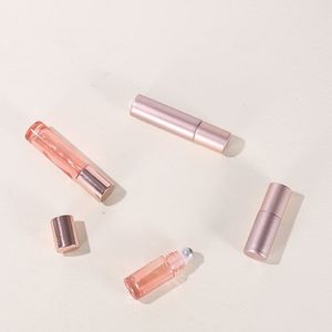 Vente chaude 5 ml 10 ml verre rouleau sur bouteille pour huile essentielle de parfum avec rouleau en métal nouveau couvercle en or rose