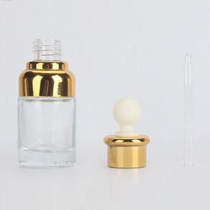 Envase de botella de loción de vidrio transparente de venta caliente para cosméticos 20ml 30ml 50ml Botellas de aceite esencial de vidrio con pipeta Gold Cap