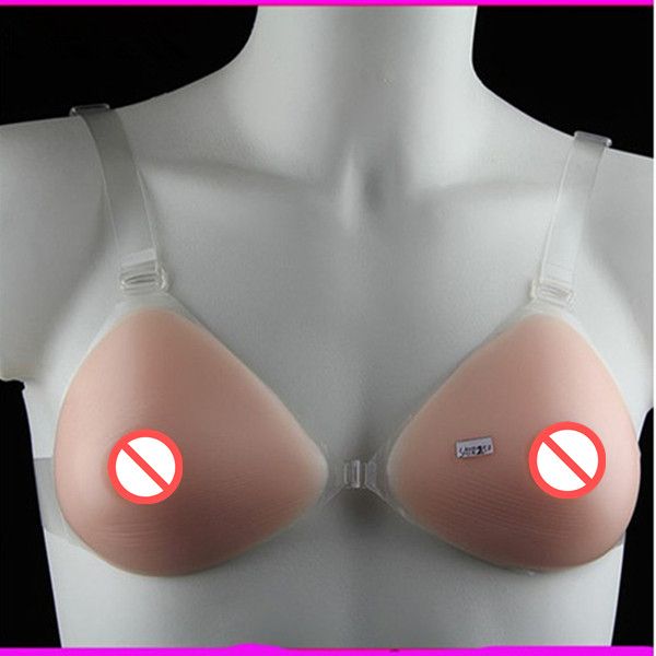 Livraison gratuite vente chaude usine approvisionnement direct forme triangulaire formes mammaires en silicone avec sangles transparentes faux seins pour unisexe