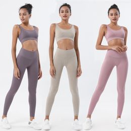 Shaping Selling Gebreide Naadloze Fitness Bra Legging Yoga Sets Nylon Sneldrogende Yoga Pak Vest Set voor Vrouwen Gym