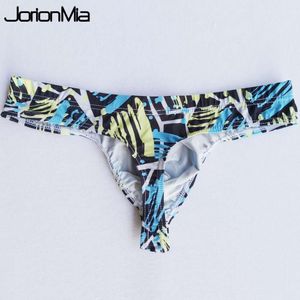 Venta caliente de los hombres Sexy impreso transparente escritos personales Bikini G String Tanga deportistas Tanga ropa interior pantalones cortos exóticos T Back HT