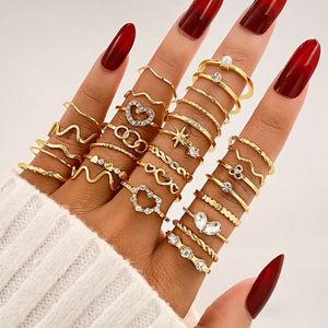 Heet verkopen minimalistische diamant ingelegde golfhartset van 28 stuks, gouden gewrichtlegeringsringcombinatie van armband voor vrouwen