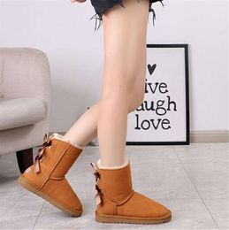 Venta caliente nuevo diseño clásico botas de nieve para mujer australianas bowknot arco bota corta y cálida US3-13 EUR 35-44 12color RGSG UGGsityf Zapatos de moda