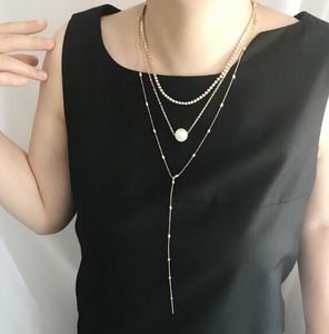 Collier de clavicule européen et américain de style chaud serti de pendentif en cristal avec trois couches de collier de perles bijoux de mode classique exquis