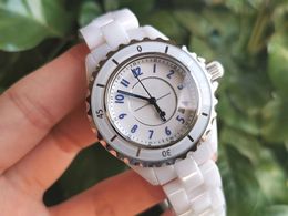 Montre en céramique blanche chaude femmes Quartz bleu numéro arabe cadran horloge 12 série céramique montre-bracelet célèbre marque Logo calendrier montres